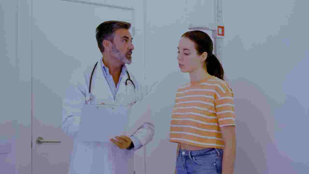a doctor talking to a woman